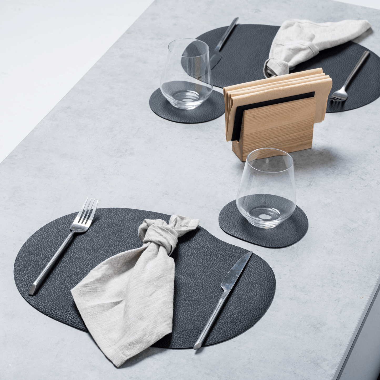 Natural leather placemat and coaster | black – Thoughtful Gift from The Gift Shop UAE