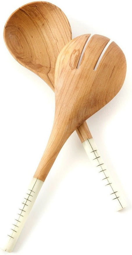Olive wood salad servers with etched cow bone handles.