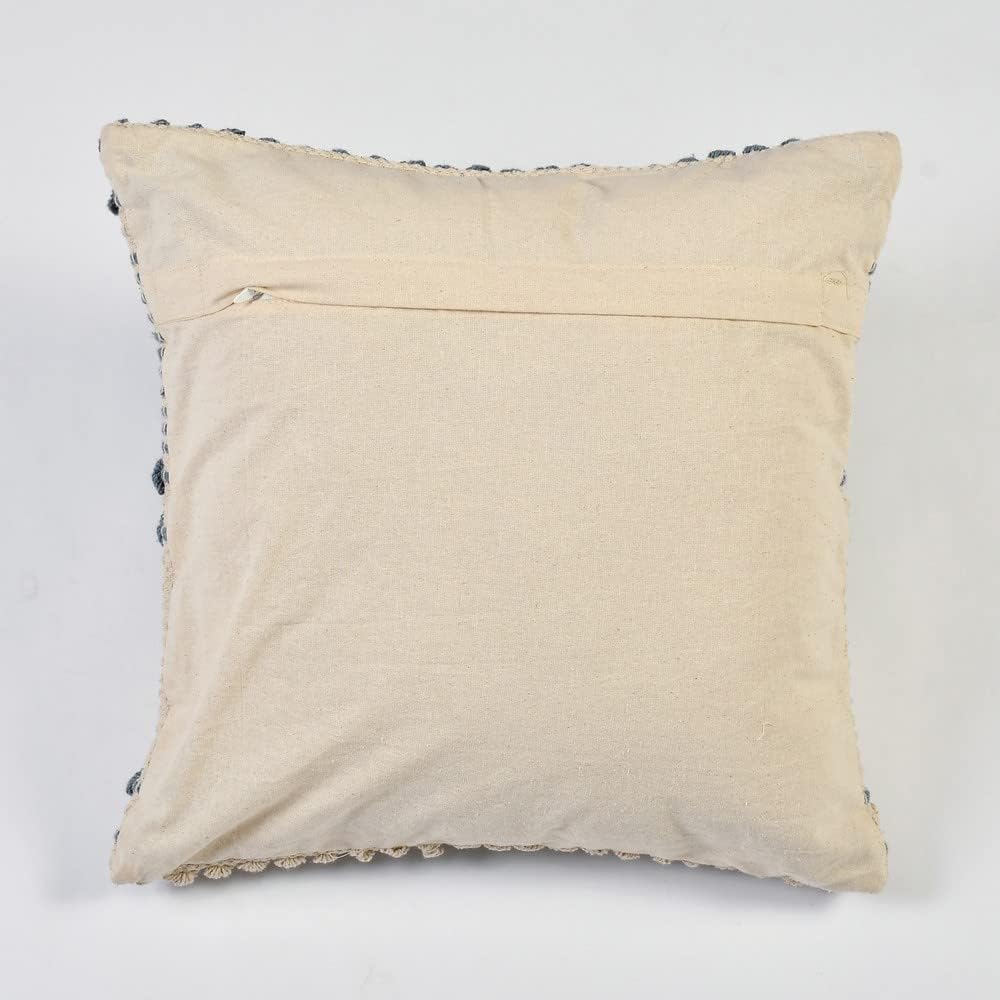 Beige pillow with decorative trim on a white background