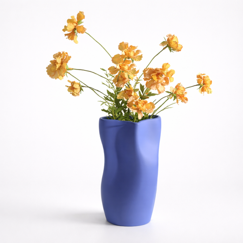 Blue vase with yellow flowers on a white background