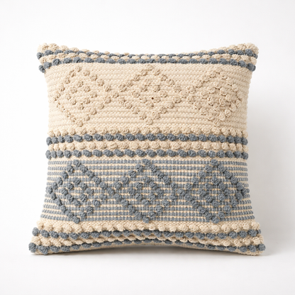 Decorative pillow with textured pattern on a white background