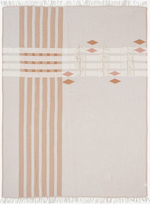 Breathable cotton throw with a striped and diamond pattern in beige and pink.