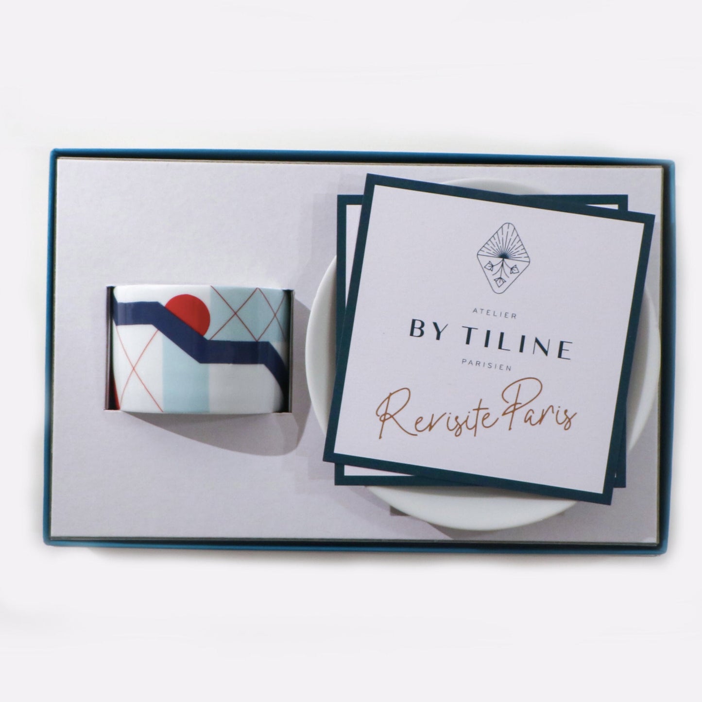 Hybrides Paris Beaubourg candle with matching white box and gold foil branding