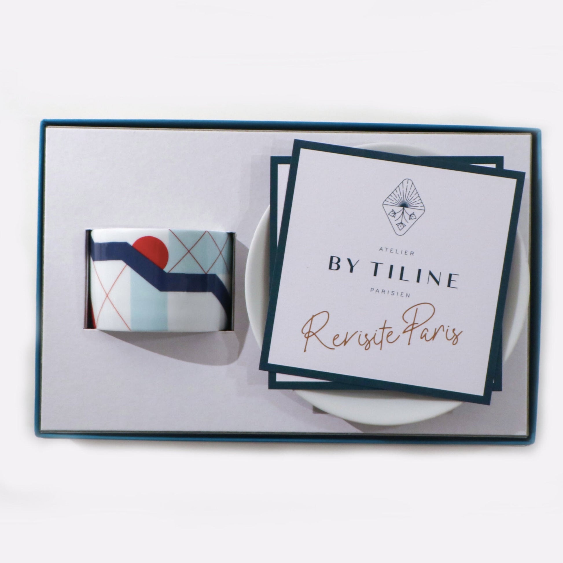 Hybrides Paris Beaubourg candle with matching white box and gold foil branding