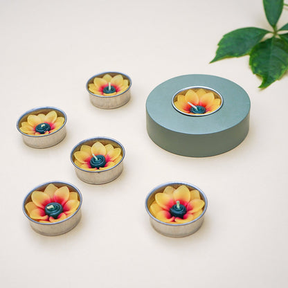 Hand-poured sunflower-shaped tealights in botanical gift box, scented with Indian jasmine