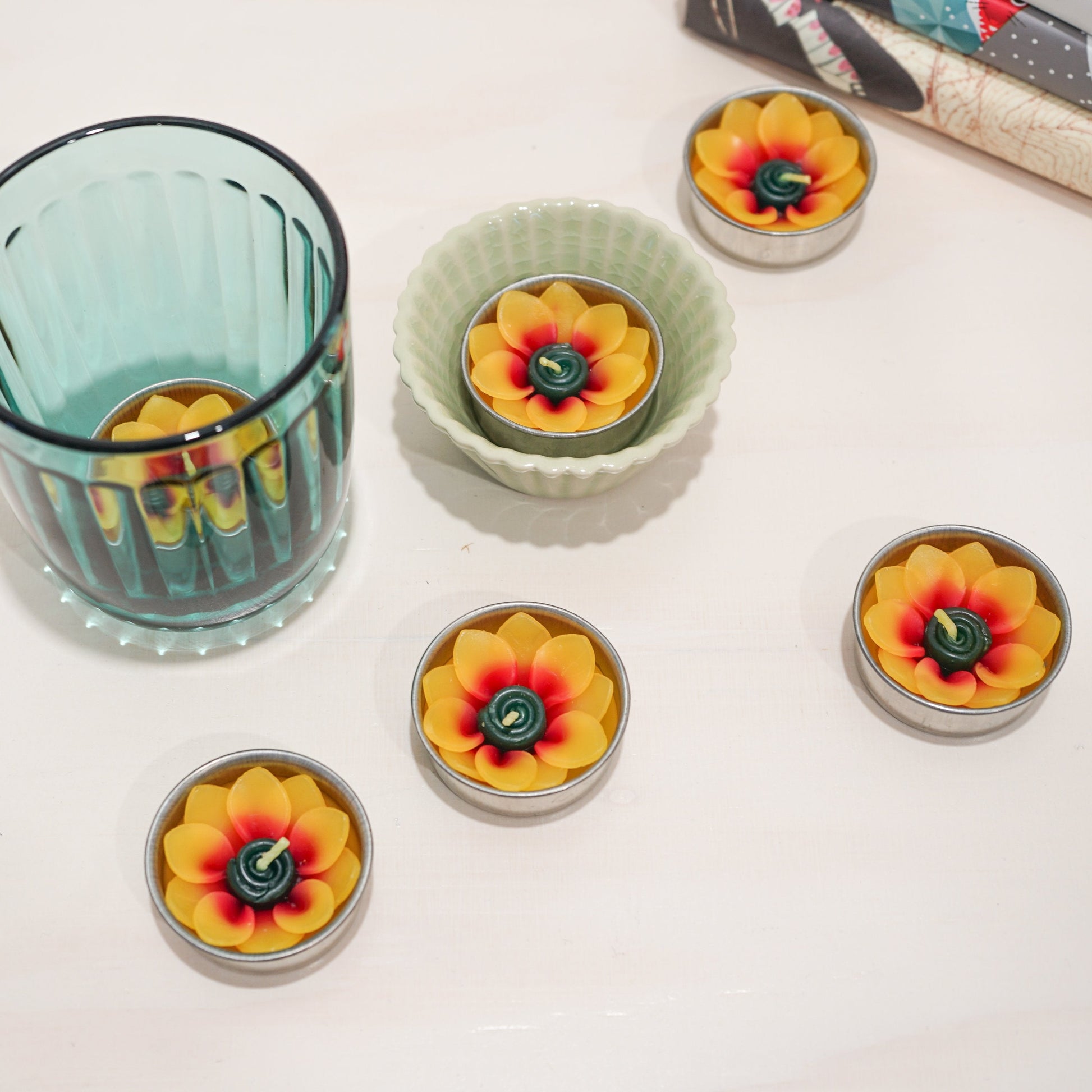 Hand-poured sunflower-shaped tealights in botanical gift box, scented with Indian jasmine